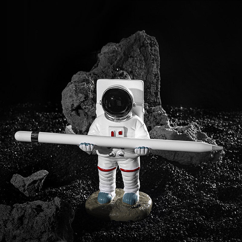 Støtte for mobiltelefon eller penn i astronautdekorasjoner | Luvikno