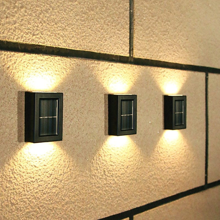 Utendørs solcellevegglampe for hagegjerdet Luvikno
