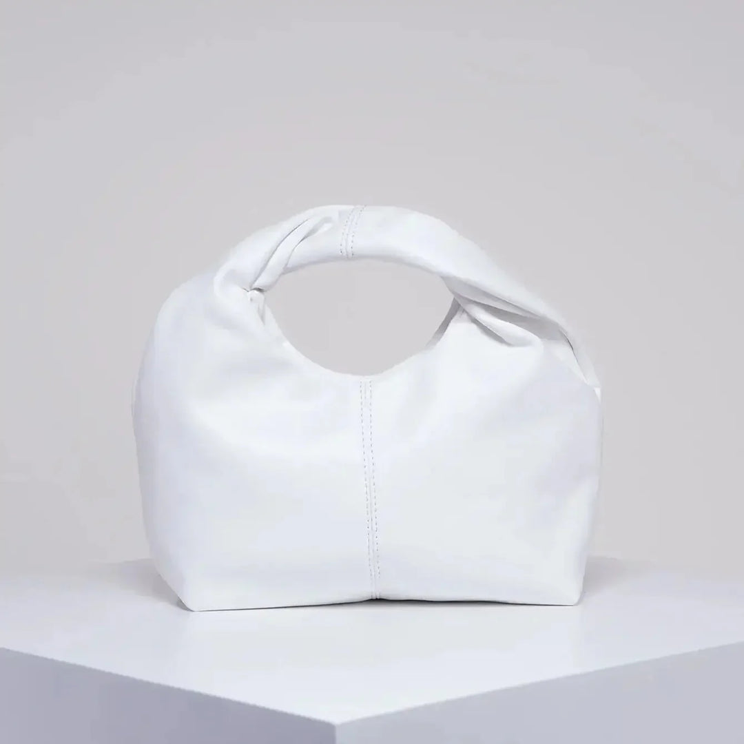 Luvik | Laukku Moteknyteveske Clutch Bag Kädessä oleva laukku