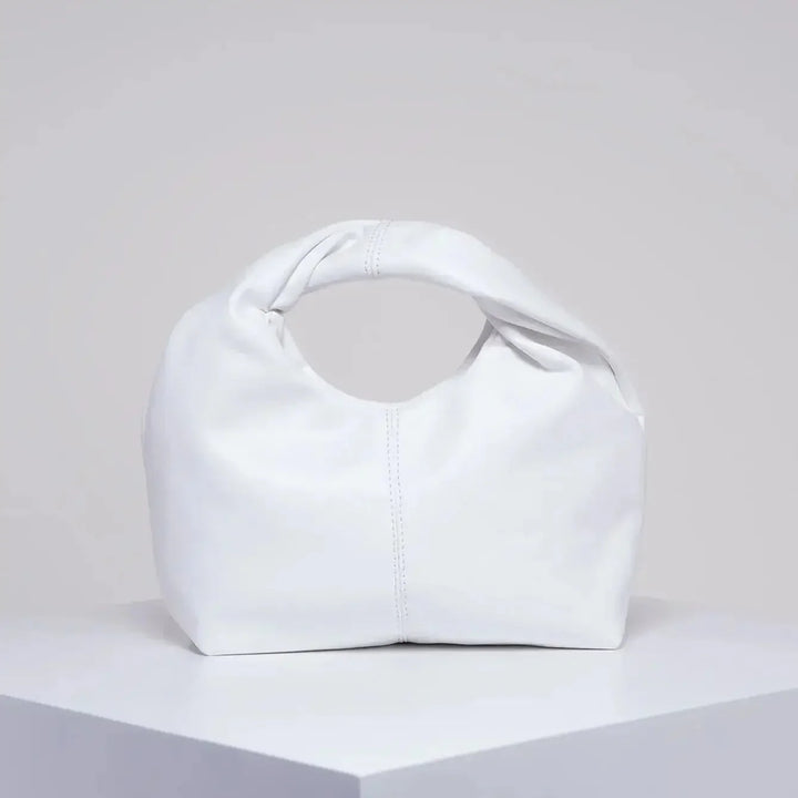 Luvik | Laukku Moteknyteveske Clutch Bag Kädessä oleva laukku
