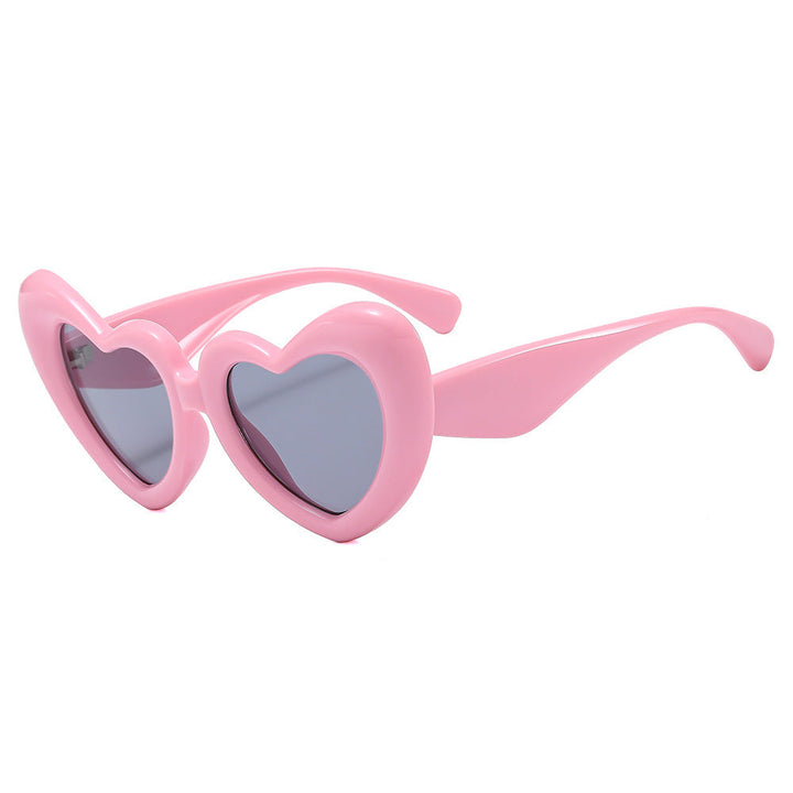 Dame Hjerteformet Solbrille med stilfull innramming Luvikno