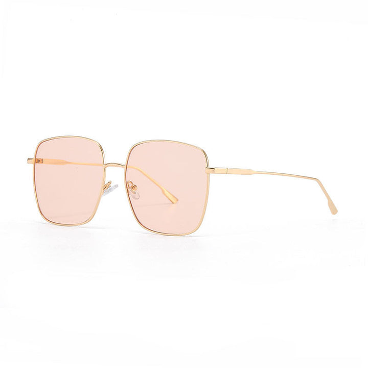 Dame solbrille med moderne firkantet rustfritt stålramme og polarisert glass Luvikno