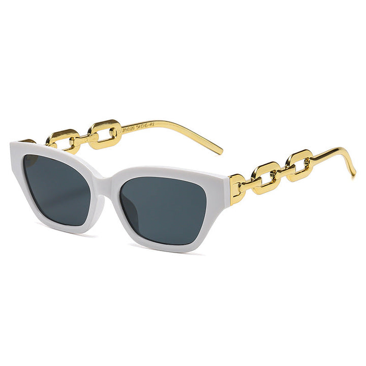 Dame Cat-Eye solbrille med dekorativ kjettingramme Luvikno
