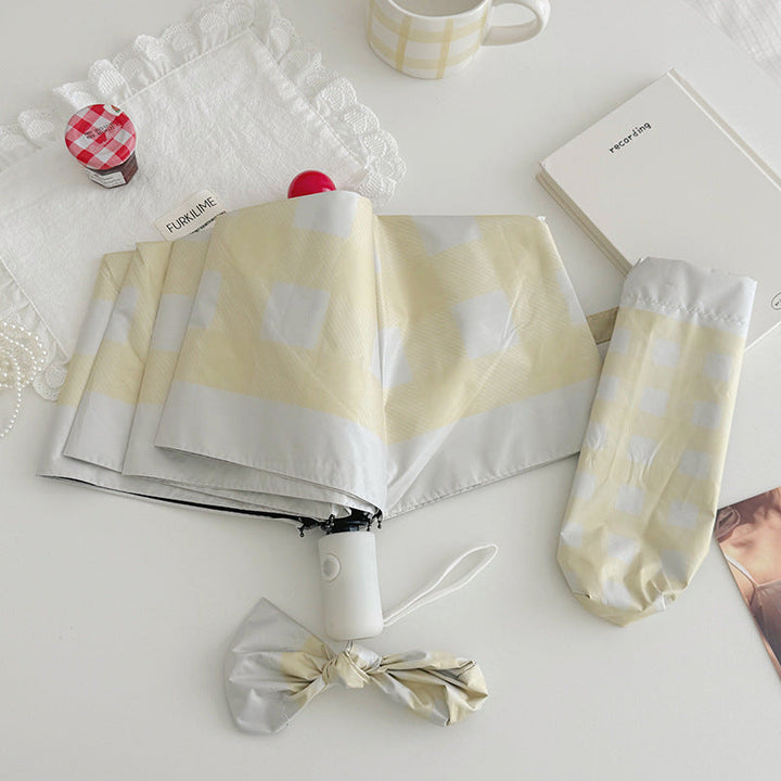 Dame sammenleggbart paraply med spesiell design Luvikno