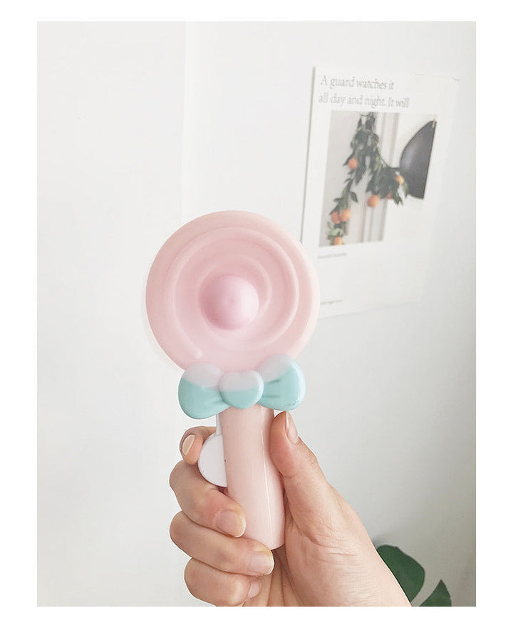 Bærbar håndholdt vifte for kvinner i lollipop-design Skanto
