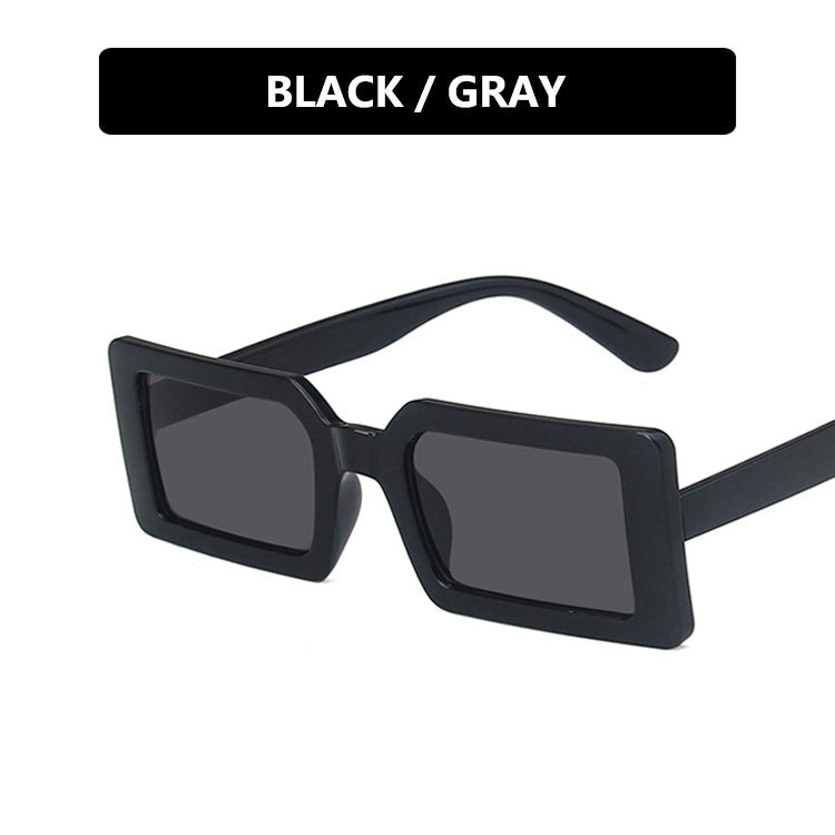 Dame kvadratisk solbrille med moderne, bred ramme og beskyttende UV-filter Luvikno
