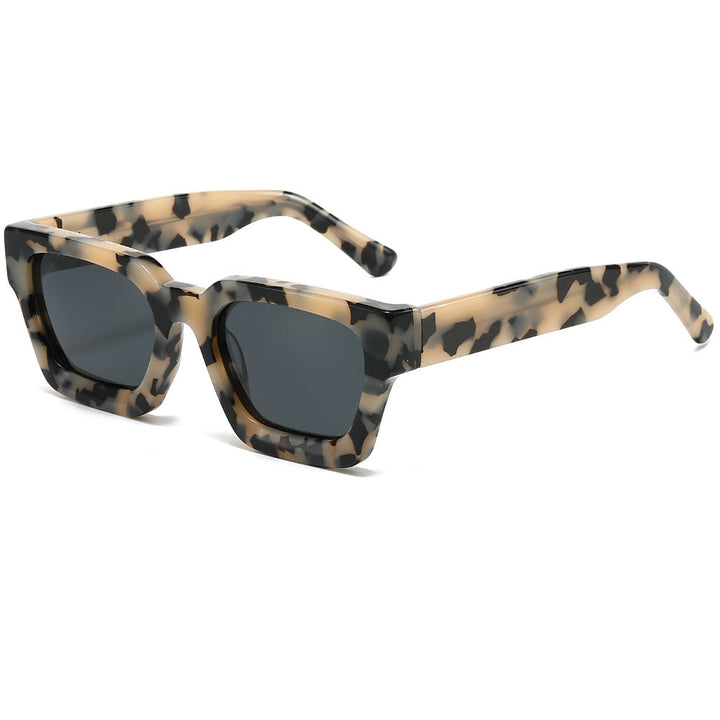 Dame designer solbrille med moderne, kvadratisk ramme og UV-beskyttelse Luvikno