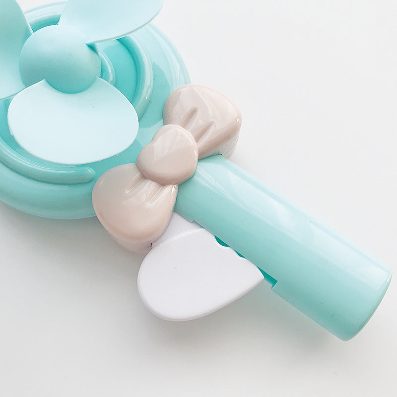 Bærbar håndholdt vifte for kvinner i lollipop-design Skanto