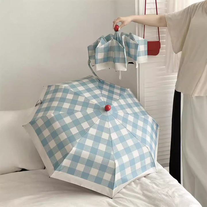 Dame sammenleggbart paraply med spesiell design Luvikno