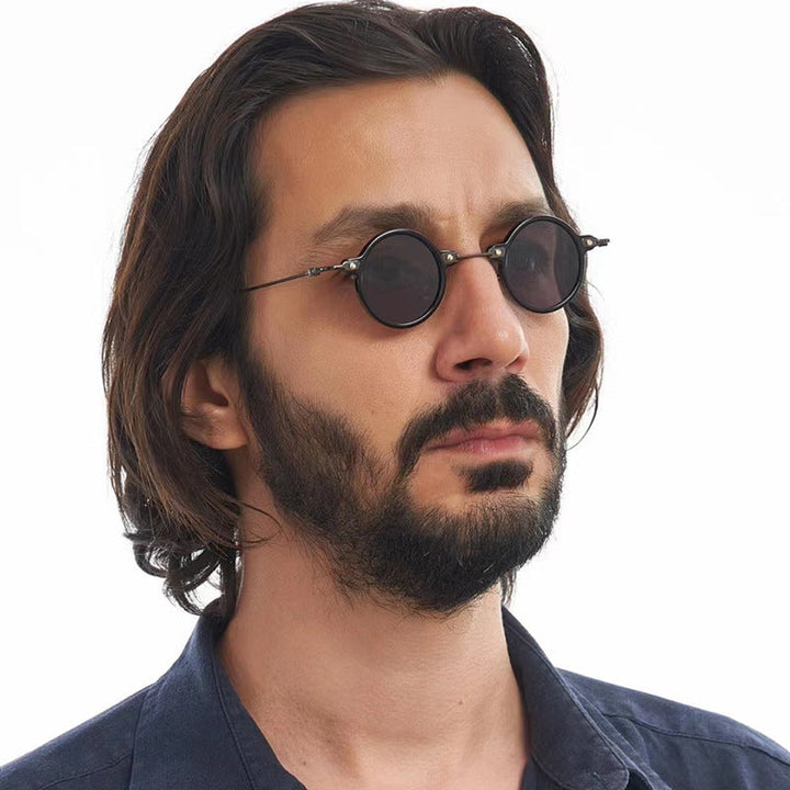 Damen moteriktig rund solbrille med stilig metallramme og polarisert glass Luvikno