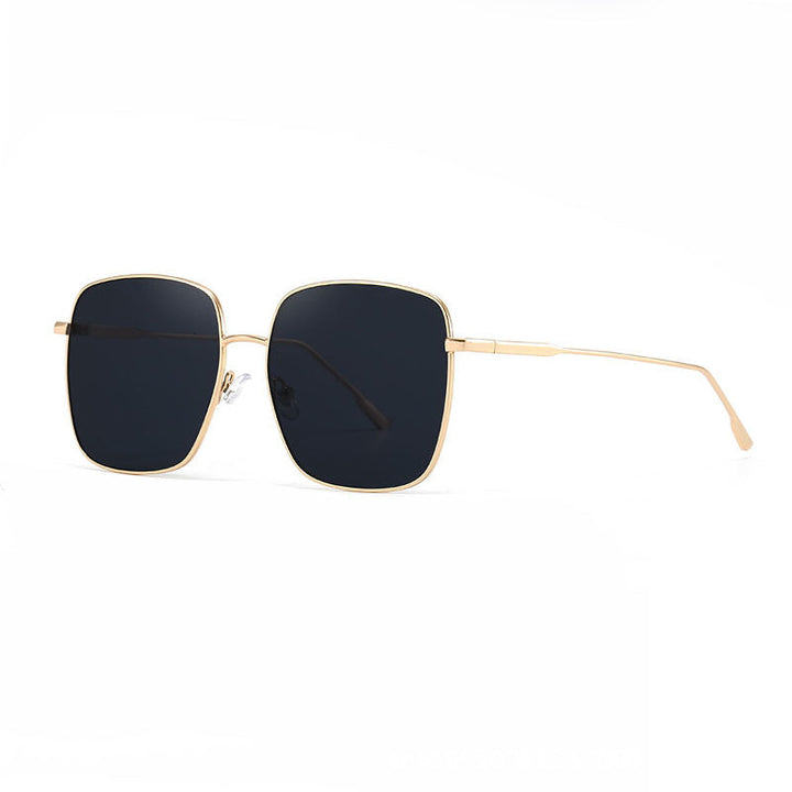 Dame solbrille med moderne firkantet rustfritt stålramme og polarisert glass Luvikno