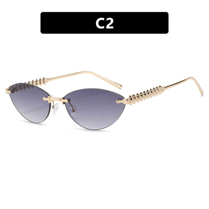 Dame solbrille i moderne, geometrisk design med stilfull metallramme og UV-beskyttelse Luvikno