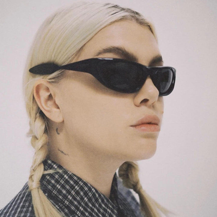 Dame sportlig solbrille med gummiert design Luvikno