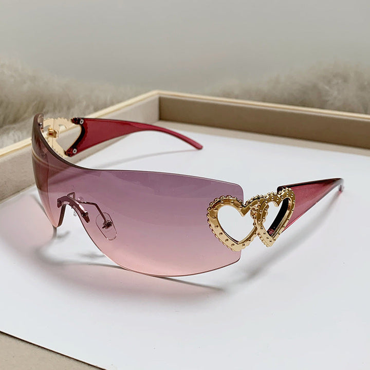 Dame designer-solbrille med luksuriøs hjerte-akseent Luvikno
