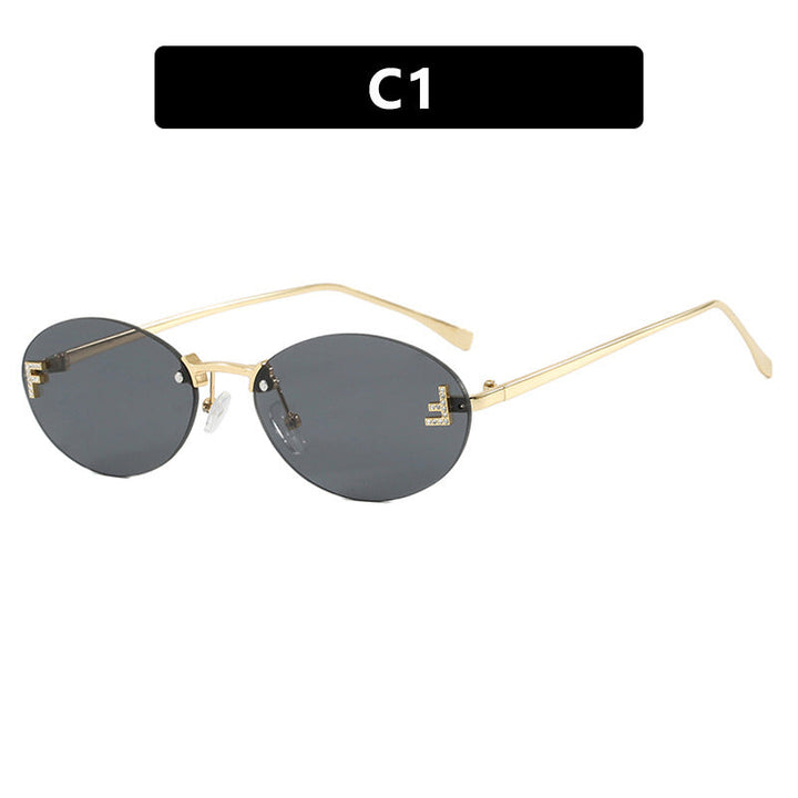 Dame mote trendy solbriller med elegante, runde glass og filigran metallramme Luvikno