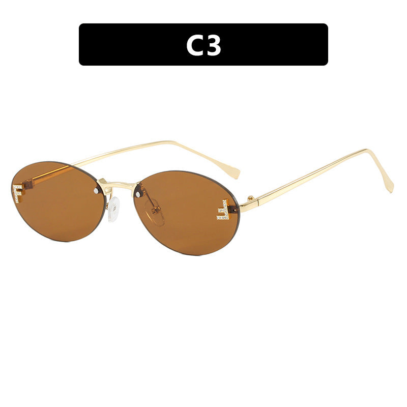 Dame mote trendy solbriller med elegante, runde glass og filigran metallramme Luvikno