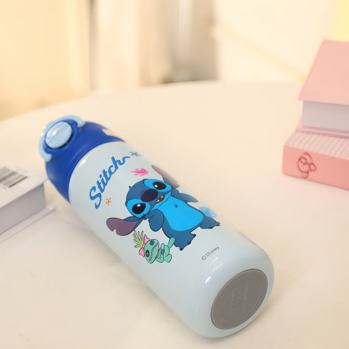 Isolert drikkeflaske med glade dinosaurmotiv Luvikno