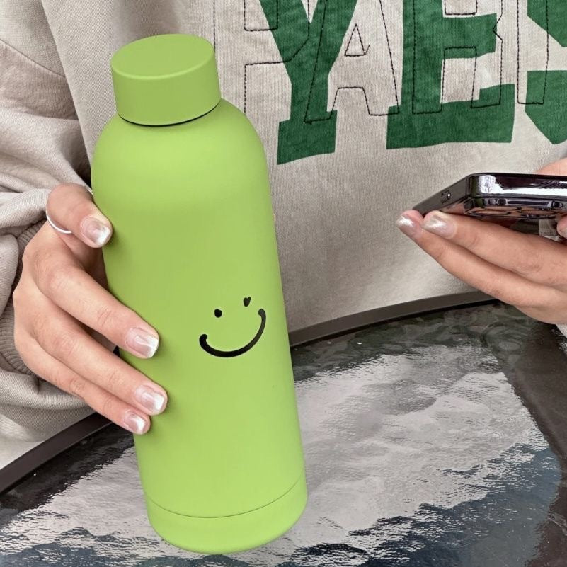 Dame isoleringsflaske med lyst smilendesign Luvikno