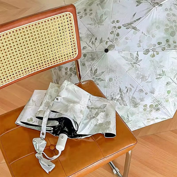Damer Faltparaply med botanisk trykkdesign Luvikno
