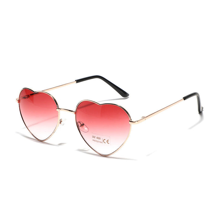 Dame hjerteformet solbrille med UV-beskyttelse og delikat ramme Luvikno