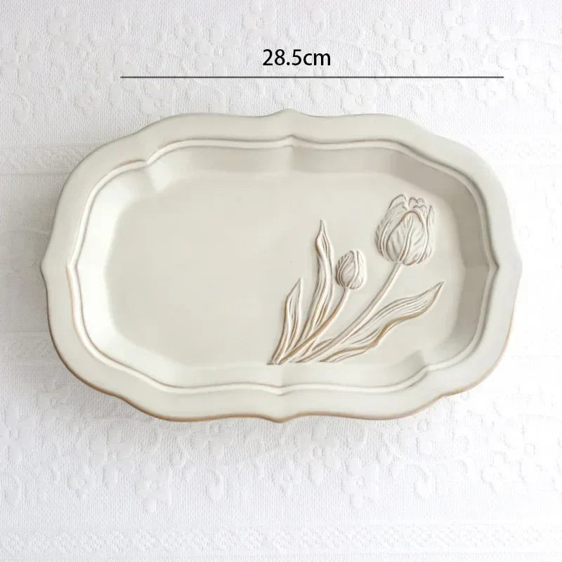 Franske pregete blomsterplater