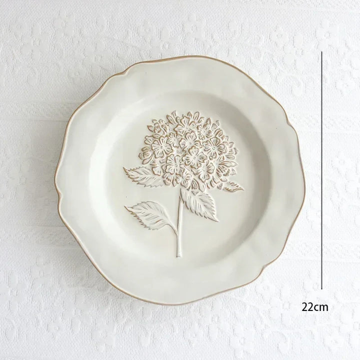 Franske pregete blomsterplater
