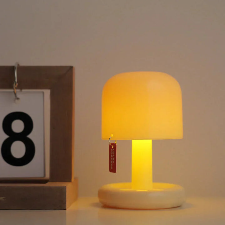 Bordlampe med mykt solnedgangslys Luvikno